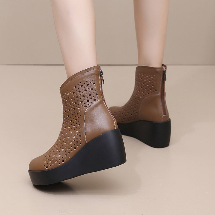 Women‘s Retro Cowhide Ankle Boots Vintage Round Toe Cutout Perforated Wedge Platform High Heels